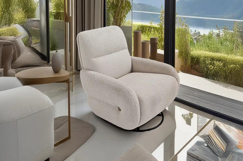 The Fresco Chair is where plush comfort meets fluid motion. Wrapped in a soft, textured boucle, its sculpted silhouette offers a cocoon-like embrace, perfect for slow mornings or sunset views.