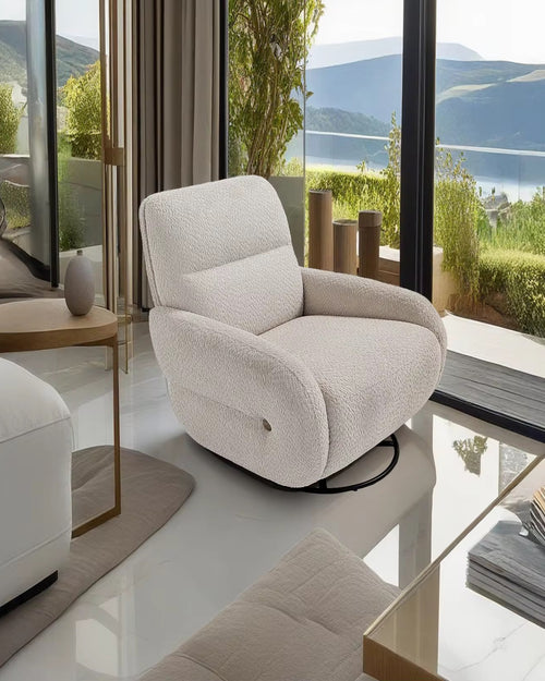 The Fresco Chair is where plush comfort meets fluid motion. Wrapped in a soft, textured boucle, its sculpted silhouette offers a cocoon-like embrace, perfect for slow mornings or sunset views.