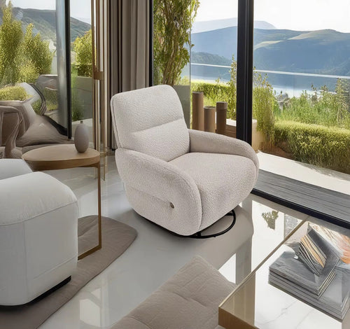 The Fresco Chair is where plush comfort meets fluid motion. Wrapped in a soft, textured boucle, its sculpted silhouette offers a cocoon-like embrace, perfect for slow mornings or sunset views.