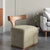 The Rumi Chair is more than seating—it’s a piece of design poetry. With its sculptural wooden backrest flowing like calligraphy and a soft upholstered base that anchors the form, it merges artistry with functionality.
