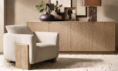 The Rune Chair brings together sculptural design and grounded elegance. Its bold silhouette is softened by plush upholstery, while the solid wooden block legs anchor the piece with a sense of stability and strength. Minimal yet striking, it’s a chair that blends comfort with architectural beauty.