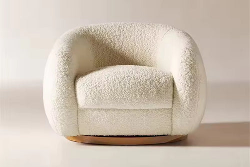 The Aalto Swivel Chair is where comfort meets modern artistry. With its rounded, cocoon-like form and plush upholstery, it invites you to sink in and unwind. The 360° swivel base adds a layer of functionality, making it as versatile as it is stylish.