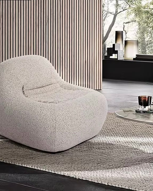 The Luma Lounge Chair combines modern design with supreme comfort, making it a standout addition to any interior. With its low-profile silhouette, rounded organic curves, and plush upholstery, this chair invites you to sit back and unwind. Designed for both relaxation and style, it’s perfect for living rooms, reading no