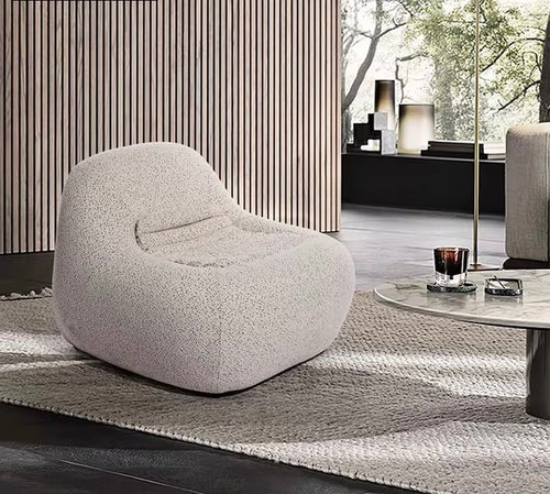 The Luma Lounge Chair combines modern design with supreme comfort, making it a standout addition to any interior. With its low-profile silhouette, rounded organic curves, and plush upholstery, this chair invites you to sit back and unwind. Designed for both relaxation and style, it’s perfect for living rooms, reading no