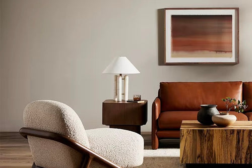 The Curo Chair is where timeless design meets modern comfort. With its architectural wooden frame and plush upholstered cushions, Curo balances strength and softness in perfect harmony. Its sculptural silhouette creates a striking statement, while the deep, inviting seat ensures everyday relaxation.