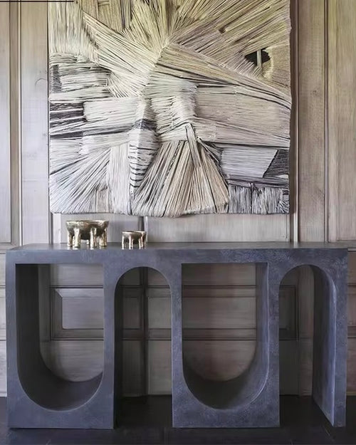 Arcus Console – Architectural Elegance, Modern Function

The Arcus Console is a striking blend of sculptural form and functional design. Defined by its bold arched cutouts and minimalist silhouette, this piece brings architectural sophistication to any interior. Whether styled in an entryway, dining room, or living space, the Arcus makes a commanding statement while offering practical surface space.