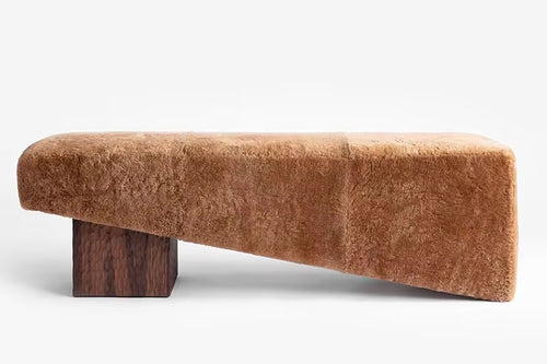 The Kona Bench blends soft textures with bold geometry, creating a piece that’s both functional and visually striking. With its plush upholstered seat and solid wood base, Kona offers a perfect balance of warmth and structure. Whether placed in a hallway, bedroom, or lounge, it adds understated elegance and inviting comfort to any space.