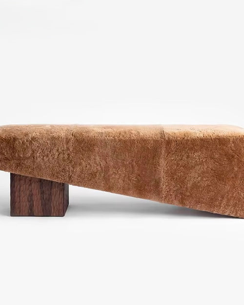 The Kona Bench blends soft textures with bold geometry, creating a piece that’s both functional and visually striking. With its plush upholstered seat and solid wood base, Kona offers a perfect balance of warmth and structure. Whether placed in a hallway, bedroom, or lounge, it adds understated elegance and inviting comfort to any space.