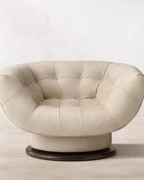The Rowan Chair combines soft curves, deep cushioning, and luxurious upholstery to create a seating experience that’s both elegant and inviting. Its rounded silhouette and smooth texture add a sculptural element to any space, while offering exceptional comfort. Perfect for living rooms, lounges, or quiet corners, Rowan brings warmth and sophistication to modern interiors.