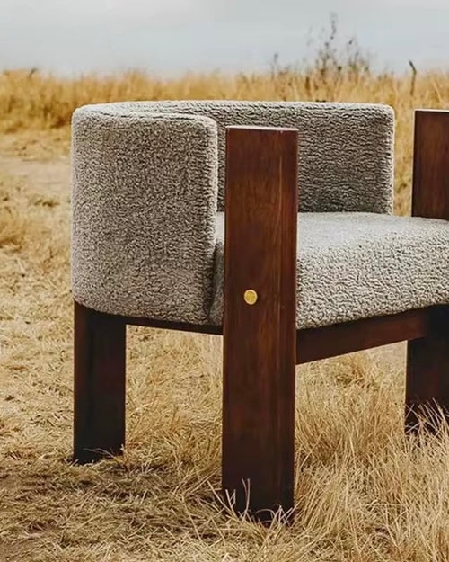 The Kors Chair is a striking blend of bold geometry and refined comfort. With its intersecting solid wood legs and softly curved upholstered seat, the chair balances architectural strength with inviting warmth. Minimal yet impactful, Kors is designed for those who appreciate furniture as both functional and sculptural.