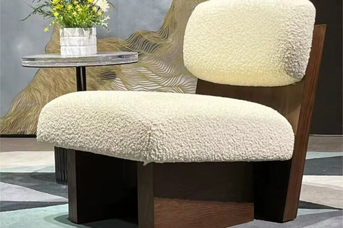 The Haven Chair is designed as a sanctuary of comfort and style. With its plush, cloud-like cushions and bold wooden base, this luxury lounge chair strikes the perfect balance between softness and structure. Its low, grounded silhouette makes it a statement piece for modern living rooms, bedrooms, or reading corners, while offering unparalleled comfort.