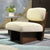 The Haven Chair is designed as a sanctuary of comfort and style. With its plush, cloud-like cushions and bold wooden base, this luxury lounge chair strikes the perfect balance between softness and structure. Its low, grounded silhouette makes it a statement piece for modern living rooms, bedrooms, or reading corners, while offering unparalleled comfort.