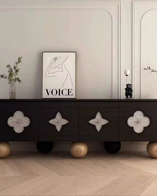 Clayton Console – Luxury Console Furniture Online in India
The Clayton Console by Chair Collective is a true luxury masterpiece for modern interiors. Designed in a perfected dark veneer structure, it features luminous Selenite marble inlays that create a glowing contrast, while its sculptural Teak wood ball legs add an artistic foundation. At 7 feet in length (approx. 20 in depth × 30 in height), this designer console exudes presence and refinement, making it a statement piece for sophisticated homes.
