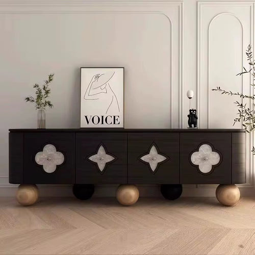 Clayton Console – Luxury Console Furniture Online in India
The Clayton Console by Chair Collective is a true luxury masterpiece for modern interiors. Designed in a perfected dark veneer structure, it features luminous Selenite marble inlays that create a glowing contrast, while its sculptural Teak wood ball legs add an artistic foundation. At 7 feet in length (approx. 20 in depth × 30 in height), this designer console exudes presence and refinement, making it a statement piece for sophisticated homes.

