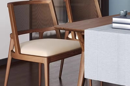 Discover the Daisy Dining Chair – modern retro seating in teak or white wood with cane backrest. Perfect as a dining chair or café chair online in India