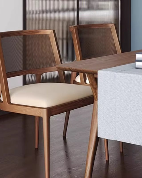 Discover the Daisy Dining Chair – modern retro seating in teak or white wood with cane backrest. Perfect as a dining chair or café chair online in India