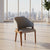 Elevate your space with the Eros Dining Chair. A modern upholstered cafe chair with an ergonomic curve, sturdy wood frame, and timeless mid-century style.

