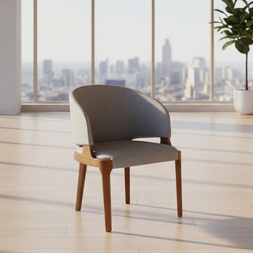 Elevate your space with the Eros Dining Chair. A modern upholstered cafe chair with an ergonomic curve, sturdy wood frame, and timeless mid-century style.

