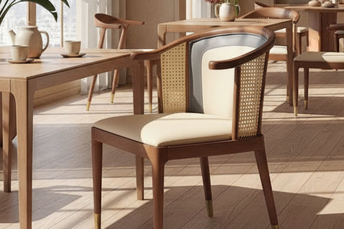 Discover the Ebaa Chair in teak wood with cane accents and gold-capped legs — a retro modern café chair crafted for luxury interiors in India.