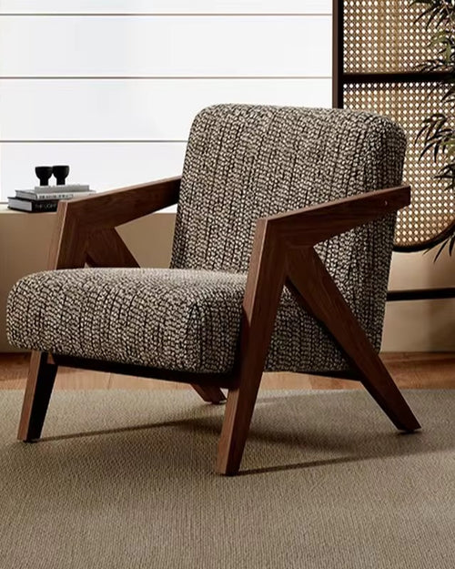 Discover the Artemis Accent Chair in teak wood — a modern classic with bold lines, plush comfort, and timeless craftsmanship for luxury interiors in India. Luxury Accent Chair Online