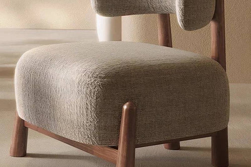 Side view of Beige lounge chair