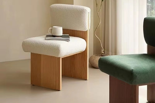 Intan Dining Chair in Japandi style with a minimal wooden frame and upholstered seat for modern dining spaces, cafés, and luxury contemporary interiors.