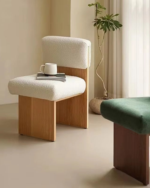 Intan Dining Chair in Japandi style with a minimal wooden frame and upholstered seat for modern dining spaces, cafés, and luxury contemporary interiors.