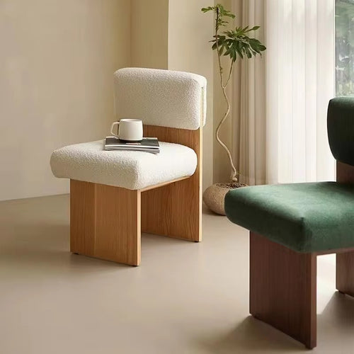 Intan Dining Chair in Japandi style with a minimal wooden frame and upholstered seat for modern dining spaces, cafés, and luxury contemporary interiors.