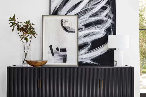 Black console with gold handles