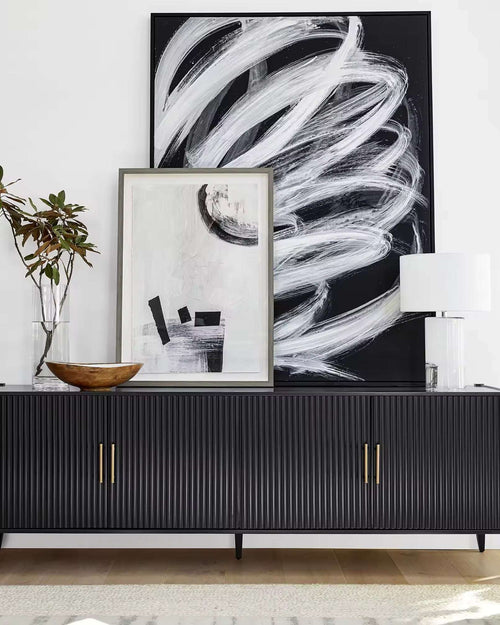 Black console with gold handles