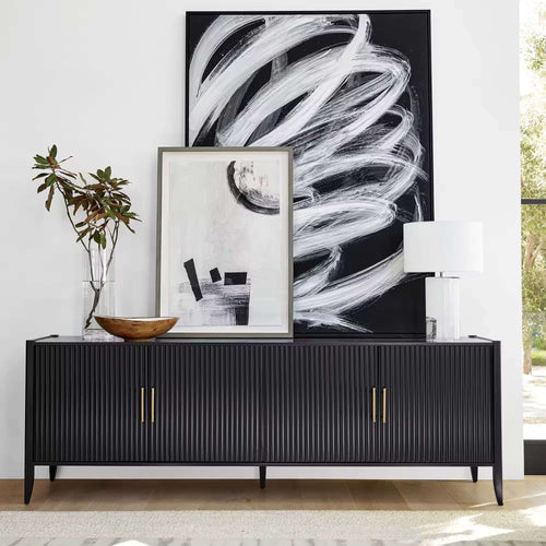 Black console with gold handles