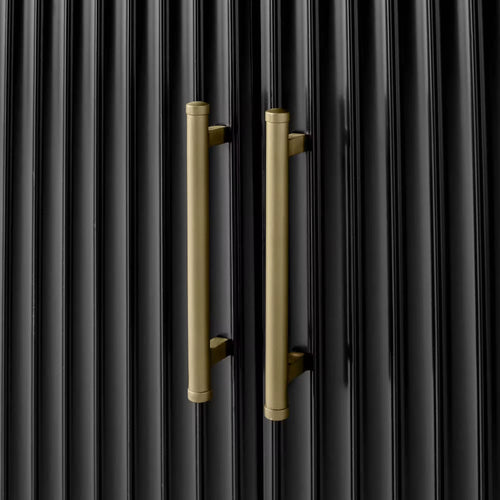 Close-up of vertical brass handles 