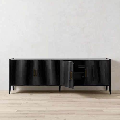 Modern black storage console with golden handles