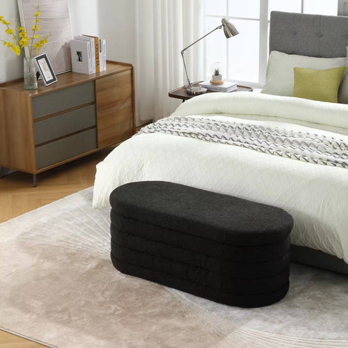 Jingo soft black oval storage seat