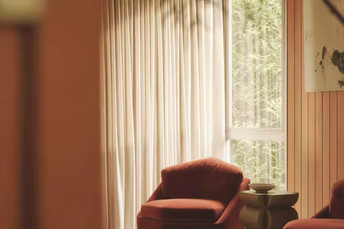 Jumanji Luxury Accent Chair — a modern geometric seat with a teak veneer base and plush comfort, redefining minimal luxury.