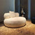 An oversized round chair with a luxurious appearance