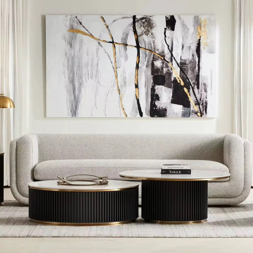 Discover the Josmo Coffee Table Set by Chair Collective — a modern fluted design with a marble top and gold base, crafted to add luxury and elegance to your living space. Shop premium luxury coffee tables online in India.