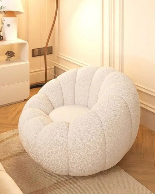 Cream Kandis Round Chair placed in a bedroom