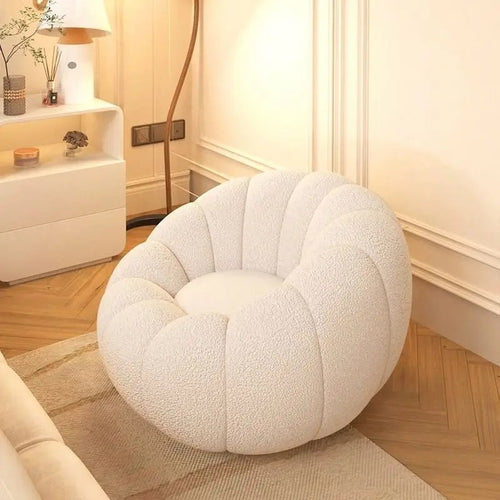 Cream Kandis Round Chair placed in a bedroom