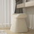 Side angle of arc white pouf 