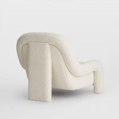 Back view of Ladro chair highlighting its curved design