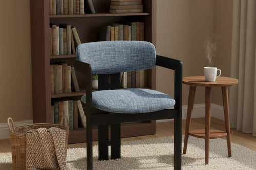 Lazio Dining Chair featuring a structured wooden frame, softly curved upholstered backrest, and cushioned seat, designed for contemporary dining interiors.