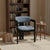 Lazio Dining Chair featuring a structured wooden frame, softly curved upholstered backrest, and cushioned seat, designed for contemporary dining interiors.