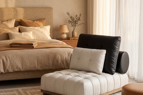 luxury tufted accent chair with teak wood base and bolster cushion