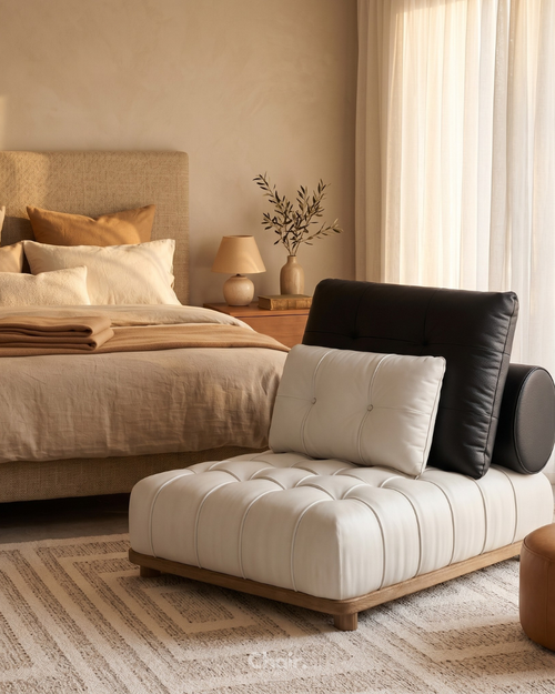 luxury tufted accent chair with teak wood base and bolster cushion