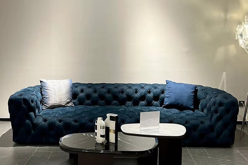 Manchester Sofa by Chair Collective featuring deep all-over quilting, a richly textured upholstered surface, and generous seating designed as a statement piece for modern interiors.