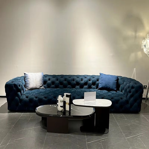 Manchester Sofa by Chair Collective featuring deep all-over quilting, a richly textured upholstered surface, and generous seating designed as a statement piece for modern interiors.