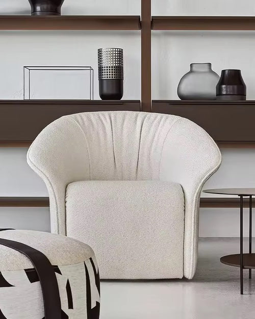 Shop the Marvin Chair by Chair Collective – a luxury modern accent chair featuring dual piping, tight stitching, and premium boucle fabric. Perfect for sleek, contemporary interiors in India.