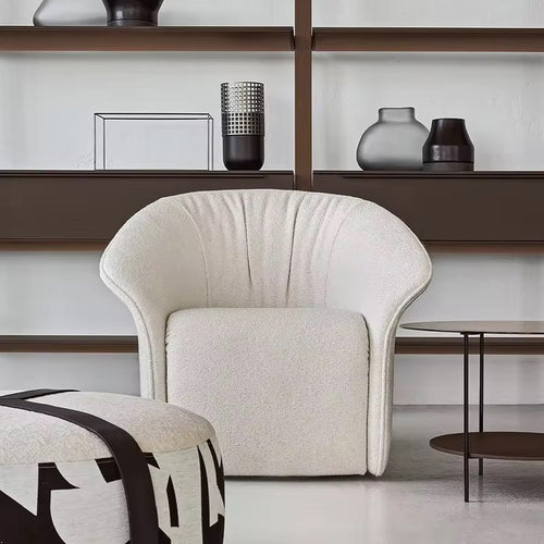 Shop the Marvin Chair by Chair Collective – a luxury modern accent chair featuring dual piping, tight stitching, and premium boucle fabric. Perfect for sleek, contemporary interiors in India.