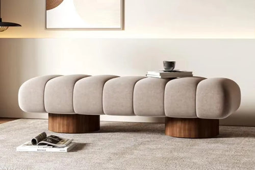 Modern Arco Ottoman with rounded segments and wood legs